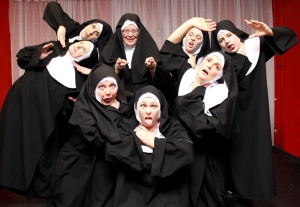 Signing expert Gaye Hampton is pictured (second from left at the back) getting in the mood by donning a habit and joining the cast of Nunsense in rehearsals. (PHOTO: PHIL MANSELL)